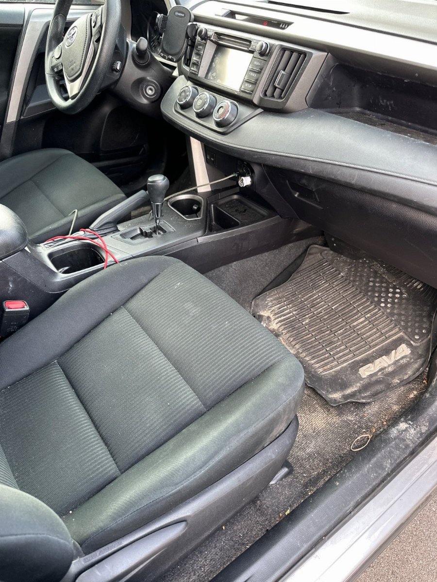 Before interior detailing in Ann Arbor, Michigan, completed by Angel.